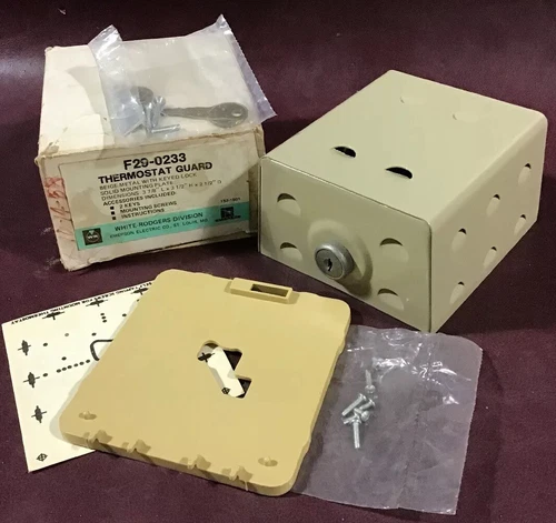 White-Rodgers THERMOSTAT GUARD. Beige Metal w/Keyed Lock.  F29-0233