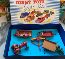 DINKY.GIFT SET 1.FARM GEAR.MASSEY TRACTOR.DISC HARROW.SPREADER.MOTO CART.TRAILER
