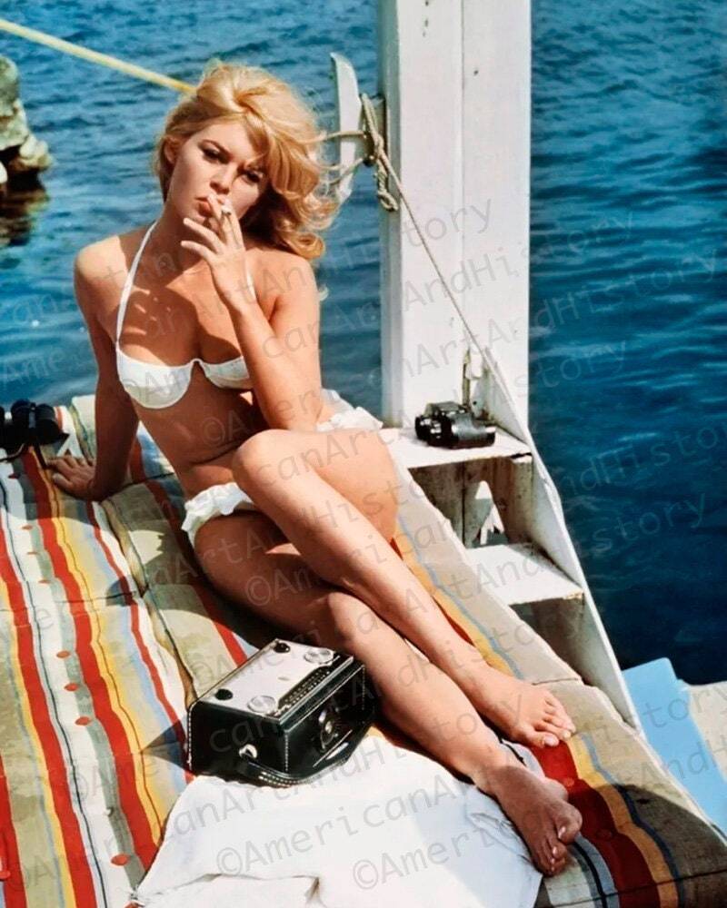 Brigitte Bardot Takes a Toke while in her Bikini Photo Print