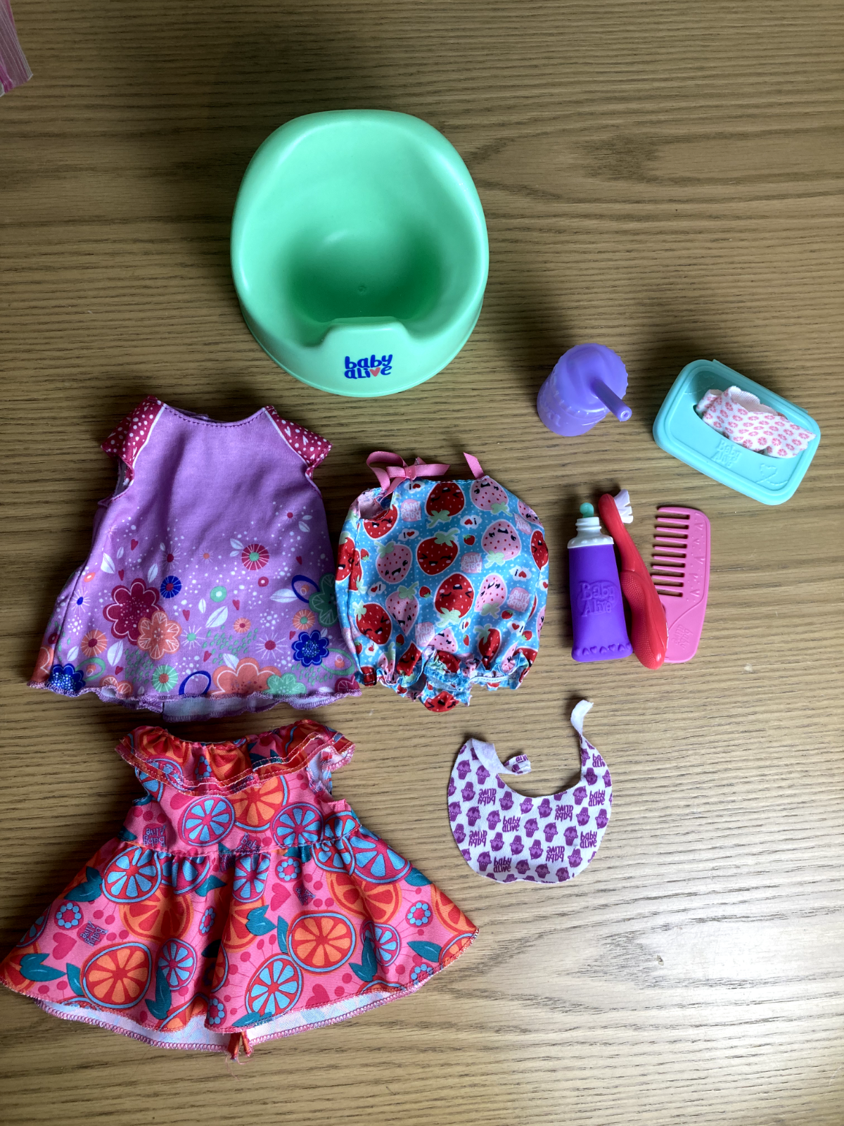 Baby Alive 10 Pc. Doll Accessories Lot - Seat, Dresses, Toothbrush, Comb, Bottle