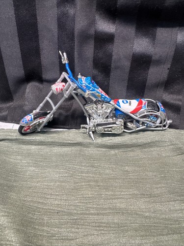 Diecast collectible model of the Orange County Choppers "Miller Welder Bike".