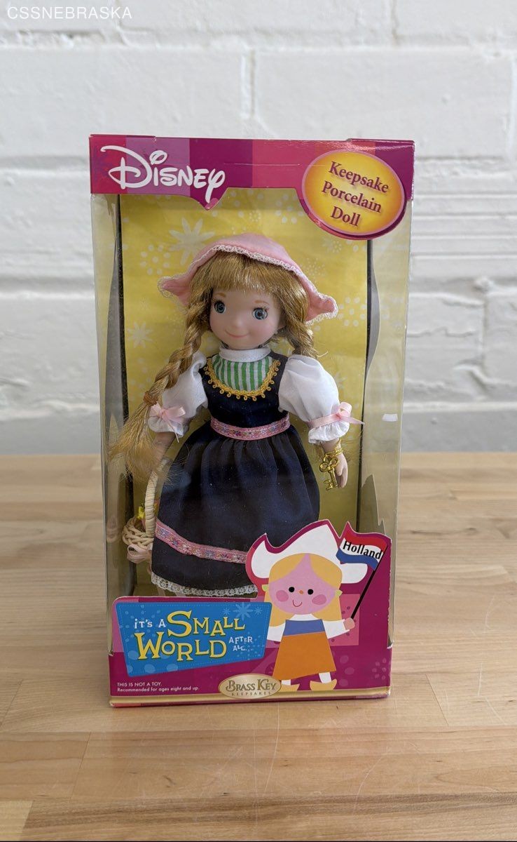 Disney Brass Key It's A Small World Porcelain Doll the Holla