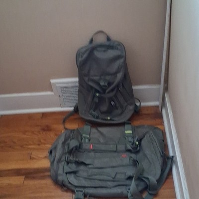 matching nixon olive dot camo duffel bag and backpack. Airline approved.