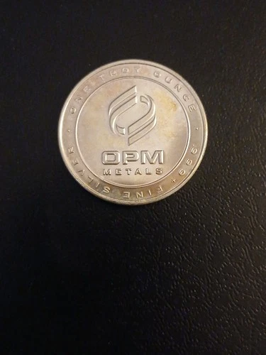 New ListingOPM Metals .999 Fine Silver 1 oz Round Slight Toning