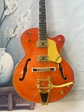 Jazz style orange hollow body electric guitar Gold Hardware 2H pickups