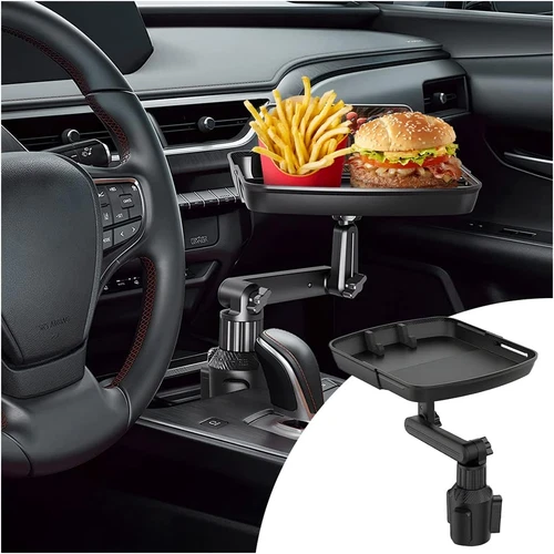 Black car cup holder tray table with orange side handles, placed on a textured gray and white dashboard.