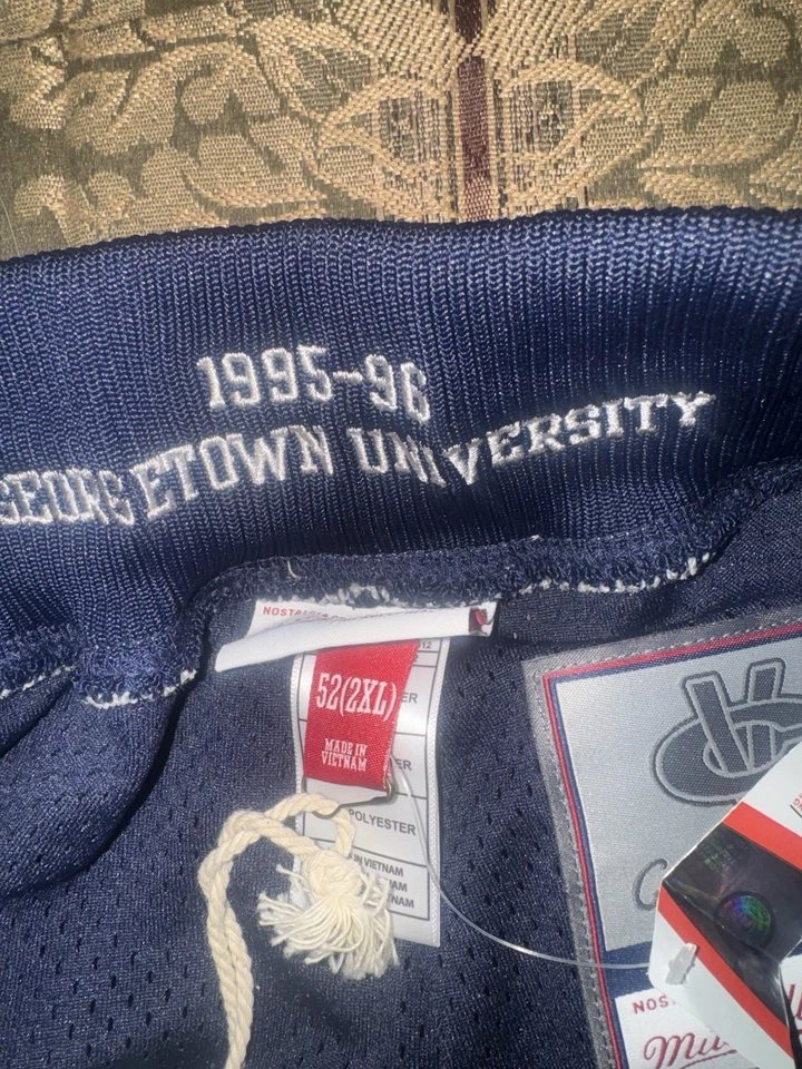 PANTALONES CORTOS DE BALONCESTO AUTÉNTICOS MITCHELL & NESS NCAA GEORGETOWN HOYAS 1995-96 2XL Foto 4 de 4