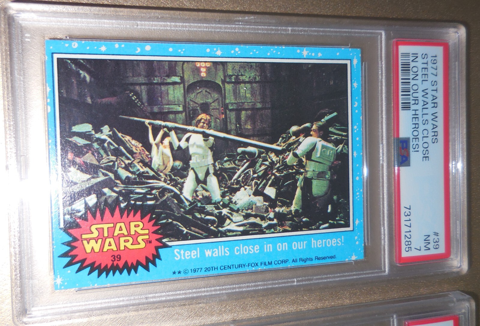 1977 Topps Star Wars #39 Steel Walls Close In on Our Heroes! PSA 7 Near MINT