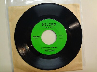 TIM JAMES: Strange Things 2:40- Motions 2:45 -U.S. 7'' 196? DELCRO Records 45-502