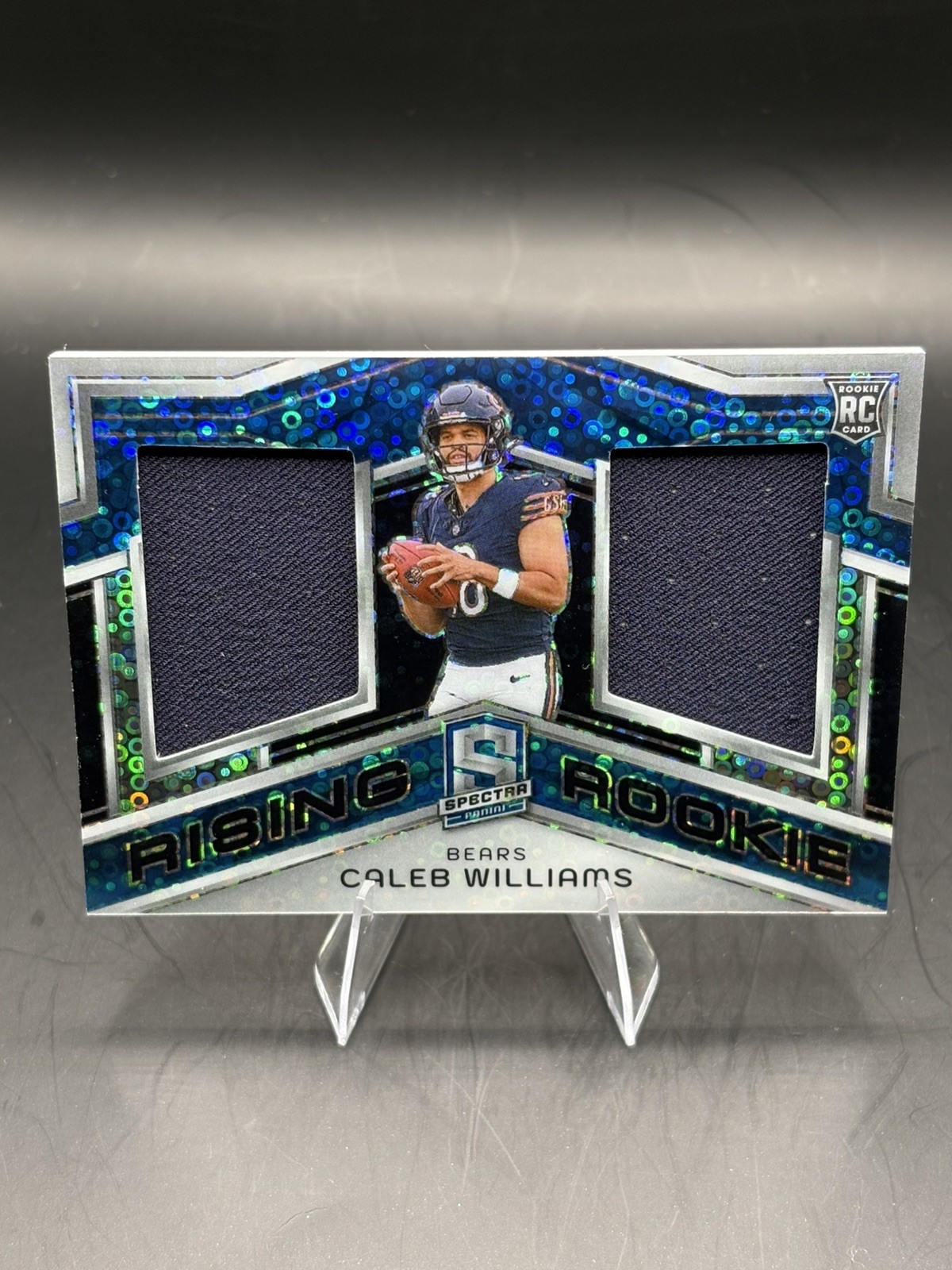 2024 Panini Spectra Rising Rookie Materials Caleb Williams Neon Blue Prizm 48/50