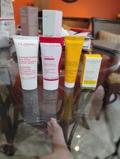 Clarins 4 Piece Travel Body Kit Exfoliate, Tighten, Hydrate And Firm