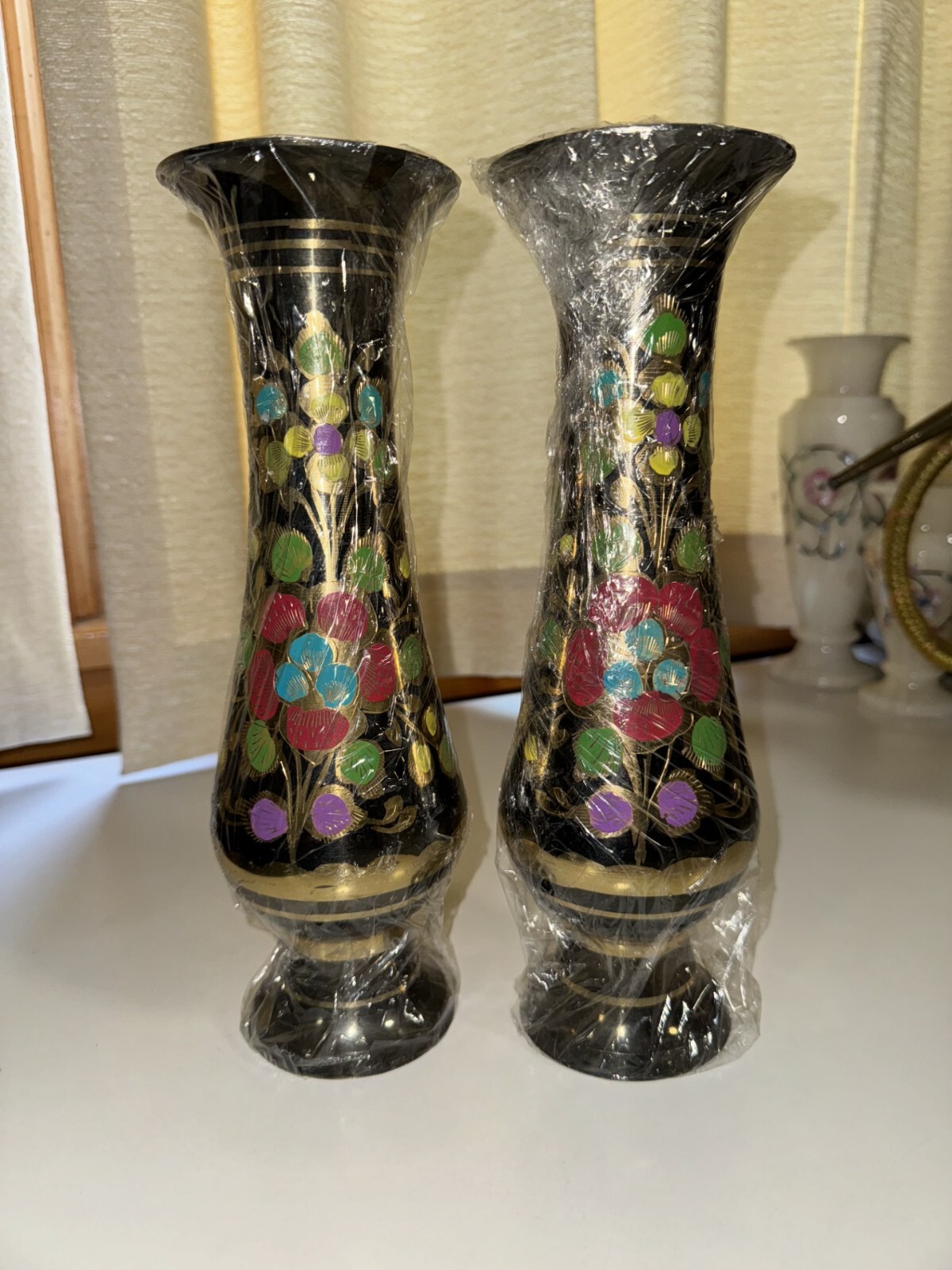 Pakistani handicrafts, black metal vase set with floral design.