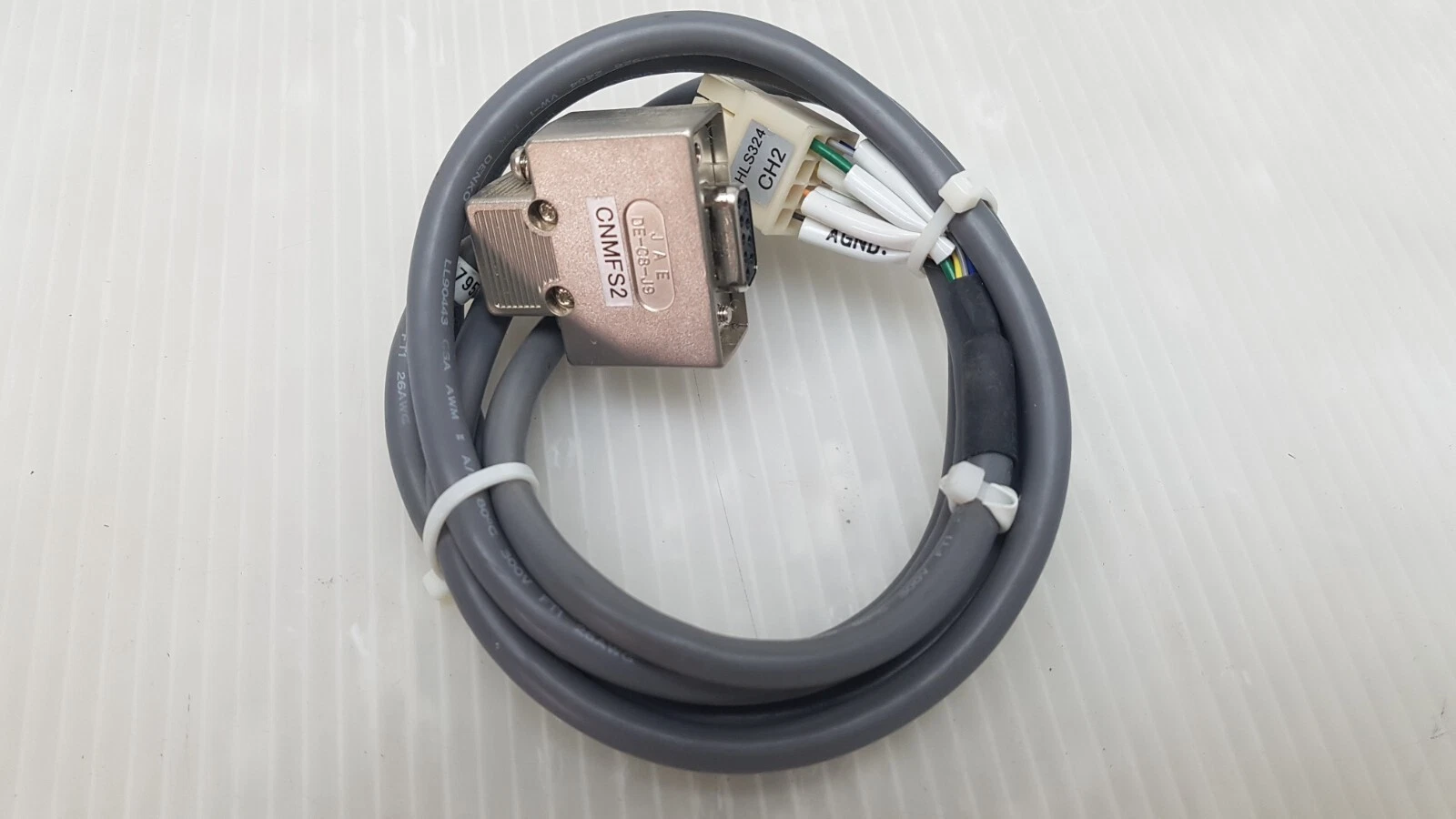 Coiled D-sub cable and multi-pin connector photographed with the MC-2302RC-4.0-C3-150LM