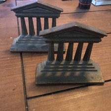 Par de sujetalibros pequeños antiguos de hierro fundido romanos griegos columna dórica Partenón