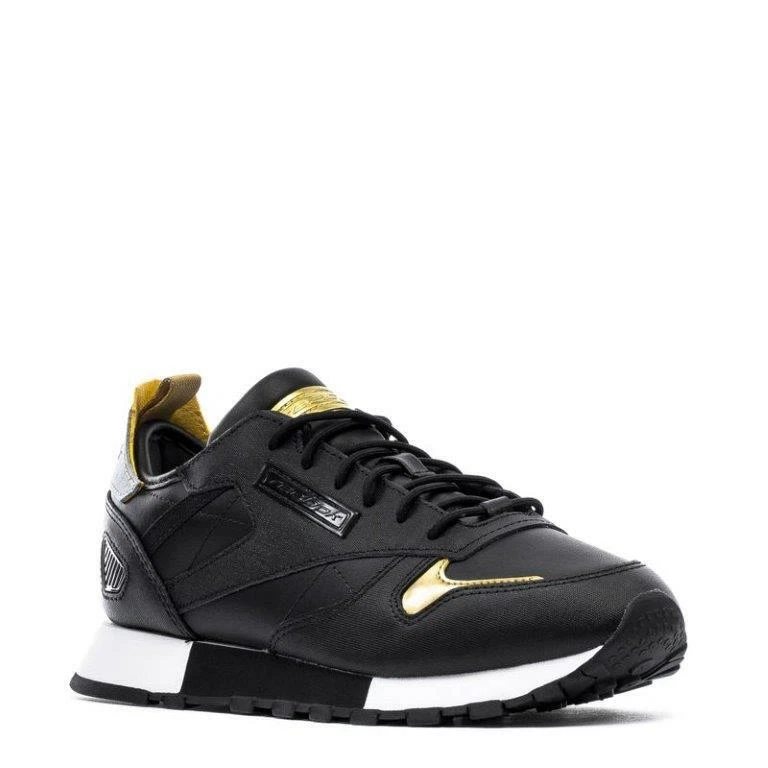 Reebok classic black and best sale gold