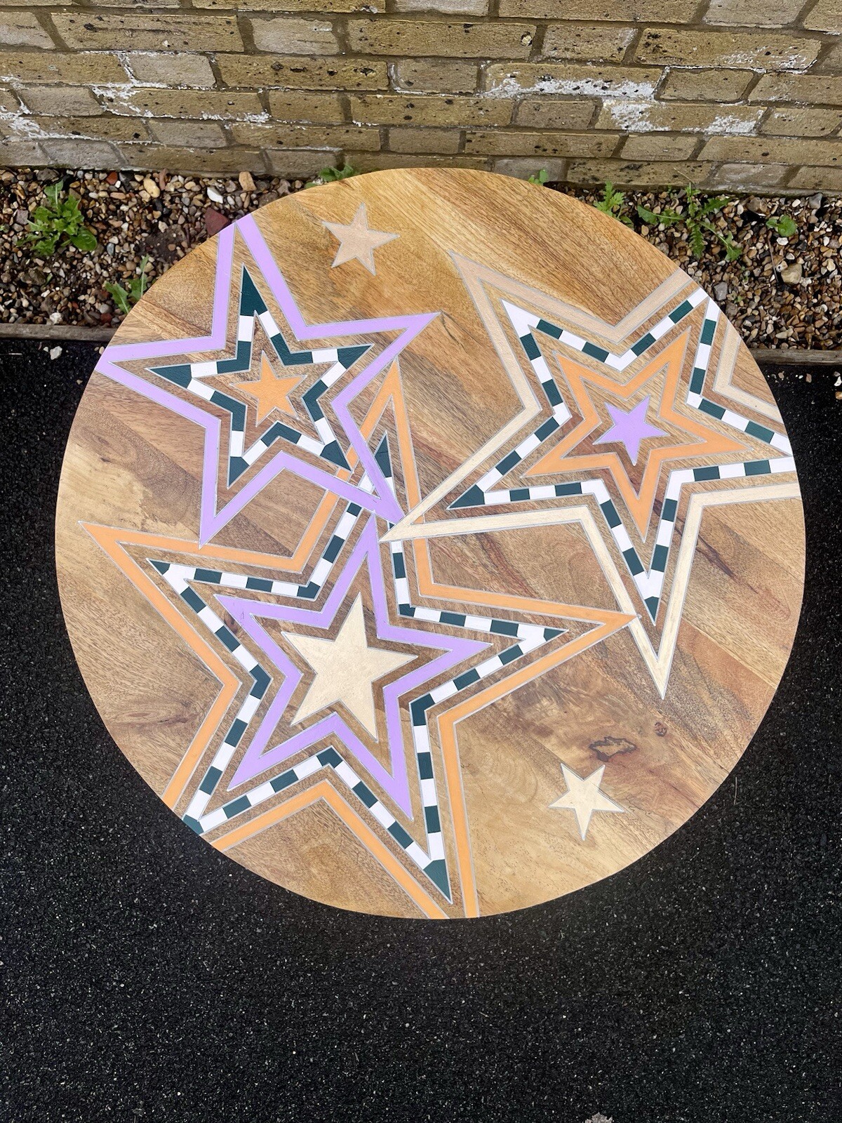 Round low star themed coffee table