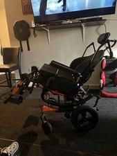 Quickie IRIS Tilt-In-Space Manual Wheelchair Orange Black