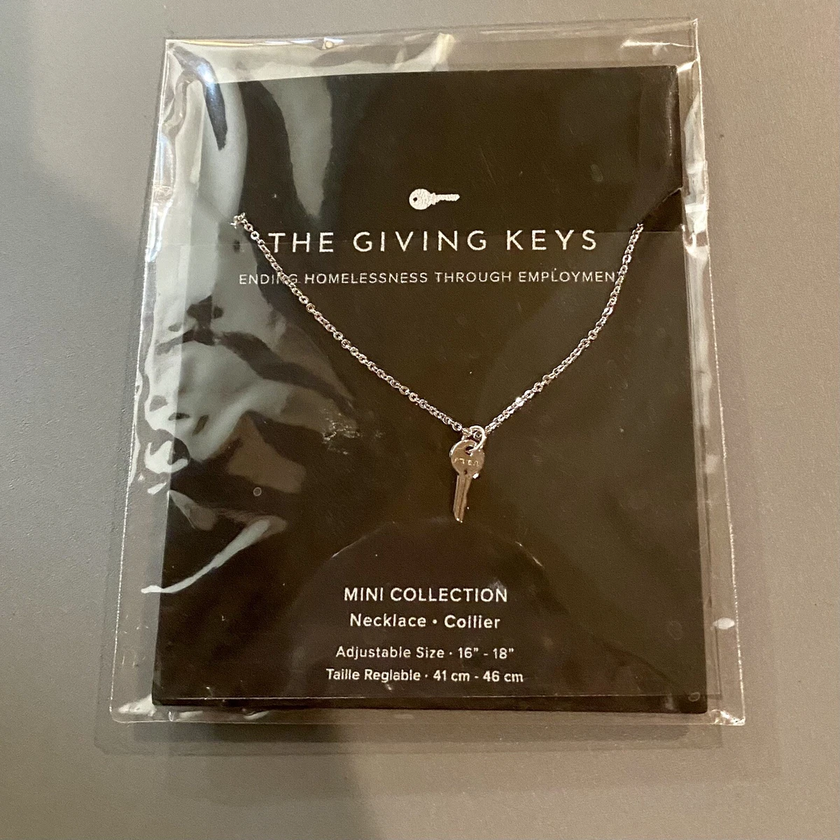 Mini giving shop key necklace