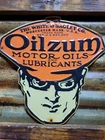 VINTAGE OILZUM SIGN OLD EMBOSSED METAL GAS MOTOR OIL GARAGE ADVERTISING DIECUT