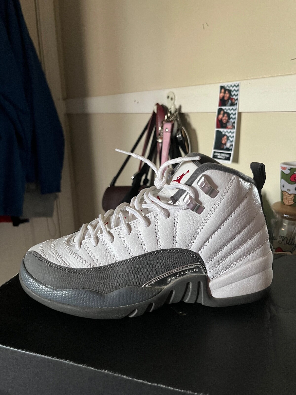 Jordan 12, Size 5.5 M. Color White,Grey,Red. Only worn a few times.