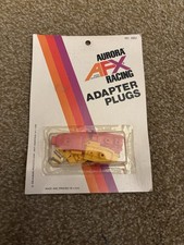 1976 AURORA AFX RACING NOS ADAPTER PLUGS UNOPENED PACKAGE 2552