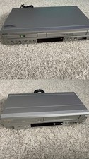 Lot Of 2 DVD VCR VHS Combo Sanyo DVW 7100 Sylvania SRD 3900 Works READ Descripti