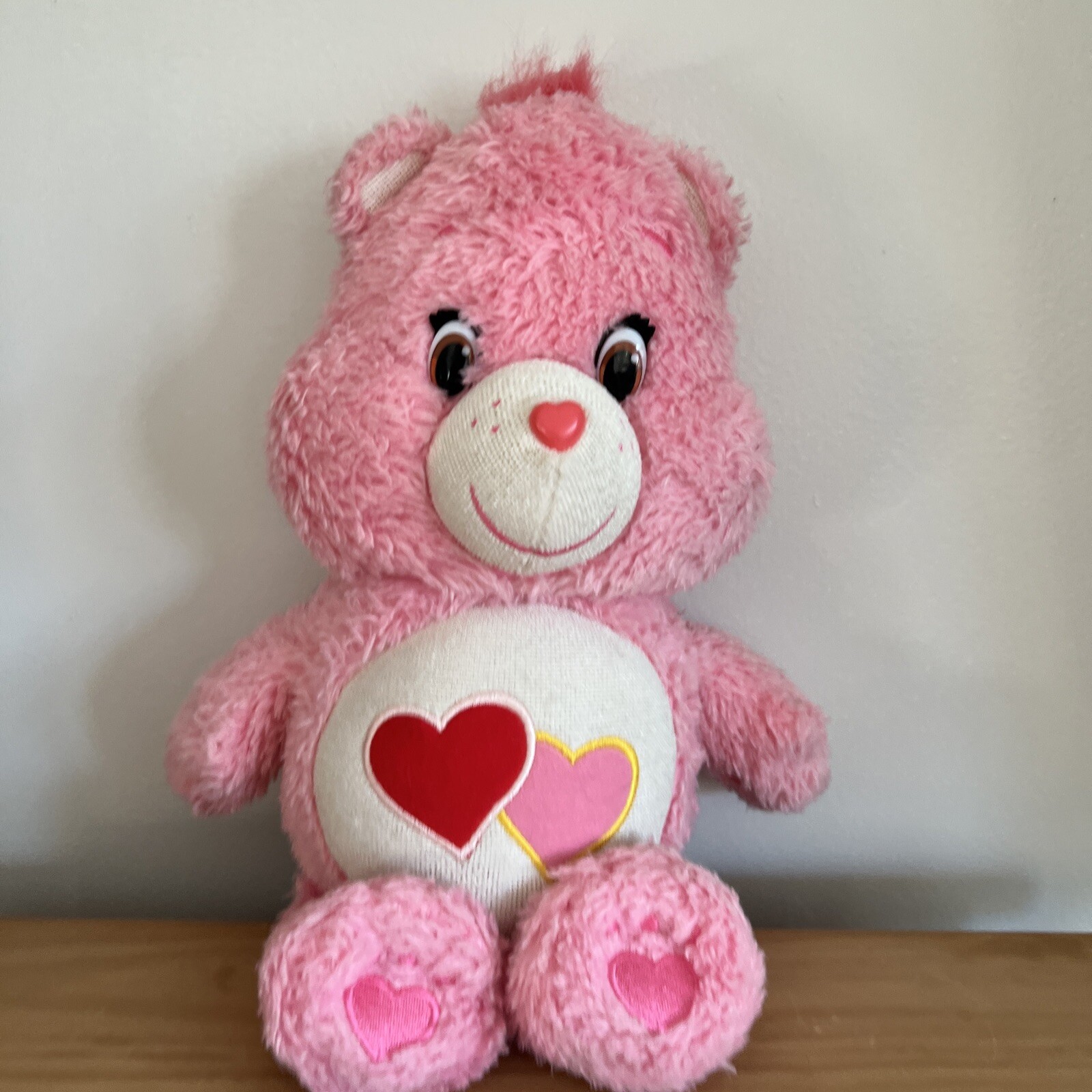 pink glow in the dark care bear