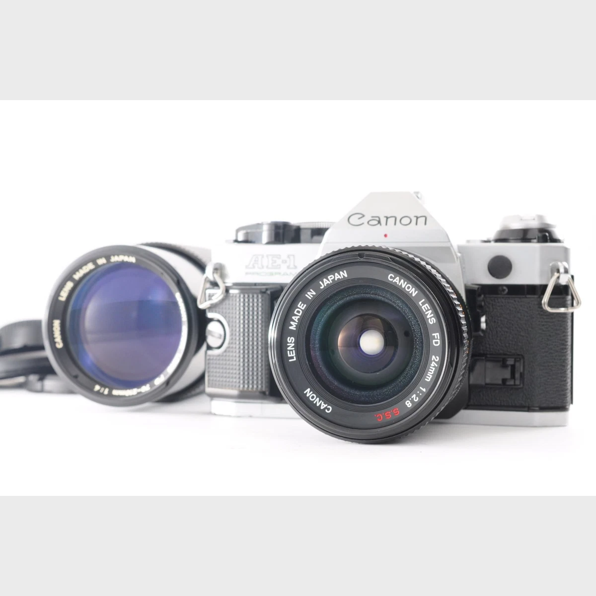 * CASI COMO NUEVO- * Programa Canon AE-1 + FD 24mm f/2.8 S.S.C. + NFD 70-210mm f/4 JPN