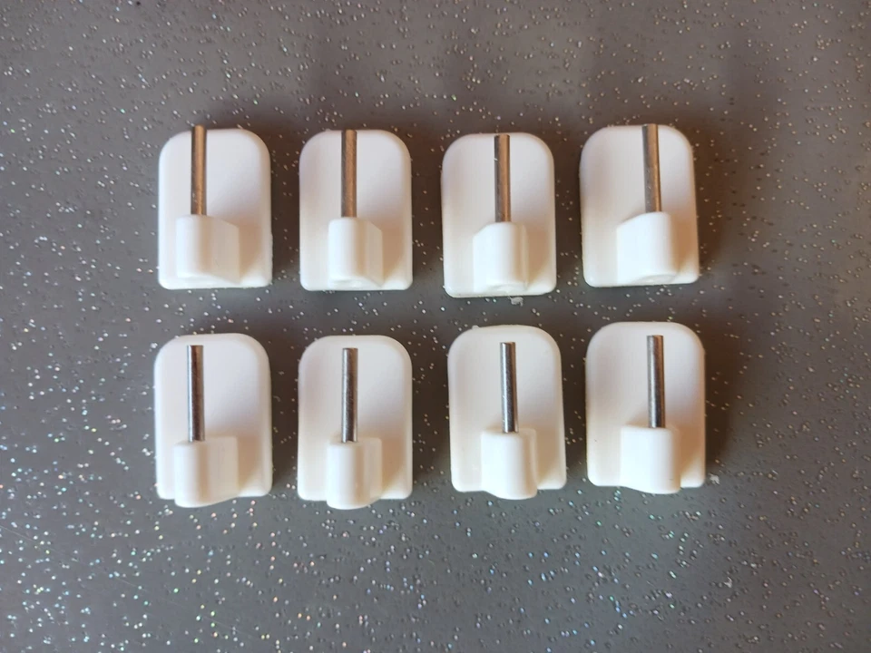 LOT DE 8 CROCHETS ADHESIFS POUR TRINGLE A RIDEAUX - Photo 1/1