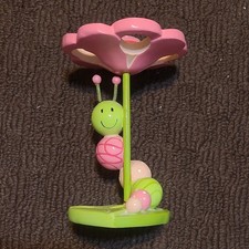 Painted Pink & Green Caterpillar on Flower to...