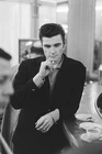 Vince Taylor lights a cigarette leaning the counter a cafe Paris N- Old Photo