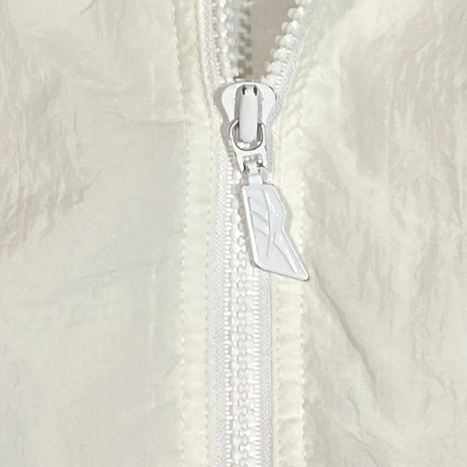 Chaqueta cortavientos vintage Reebok para hombre grande azul marino blanco bloque de color cremallera completa años 90 Foto 4 de 4