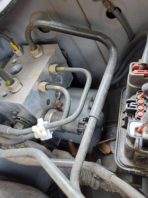 Used ABS Pump and Motor Assembly fits: 2003 Infiniti G35 Pump MT w/vehicle dynam