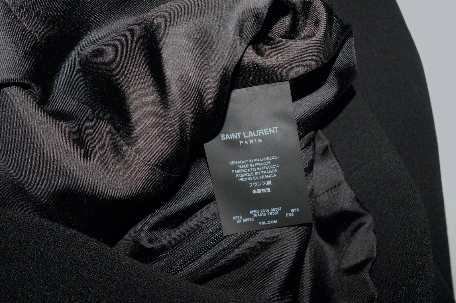 SAINT LAURENT (YSL) Mini abito a croce borchie Saint Laurent in lana nera taglia FR 34 US 2