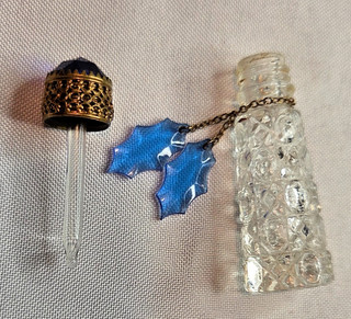 Vintage Czech Irice miniature perfume bottle with blue jewel top and leaves