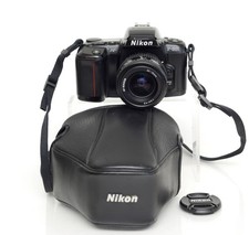 Nikon F-601 Auto Focus 35mm Film SLR w/ 35-70mm Zoom Lens and CF-46 Case. Tested