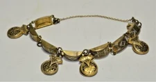 Damascene Gold/Silvertone 4 Dangle Charms Castanet Clapers Shape 6 1/2" Bracelet