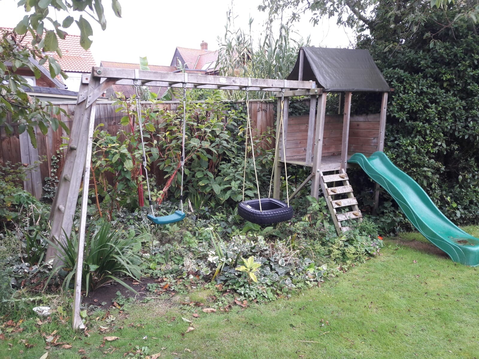 treehouse with slide and swing