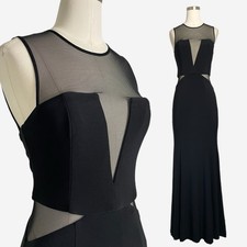 Cach  Black sleeveless illusion paneled cut out sheer mermaid maxi gown formal 2
