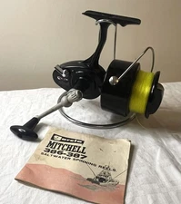 Vintage Mitchell 387 RHW Fishing Reel With original Booklet.