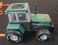 Vintage nylint farms green pressed steel and plastic tractor