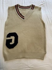 Beige Tight-Knit Sleeveless V-Neck Sweater Vest. Striped Trim. Logo. Casual.