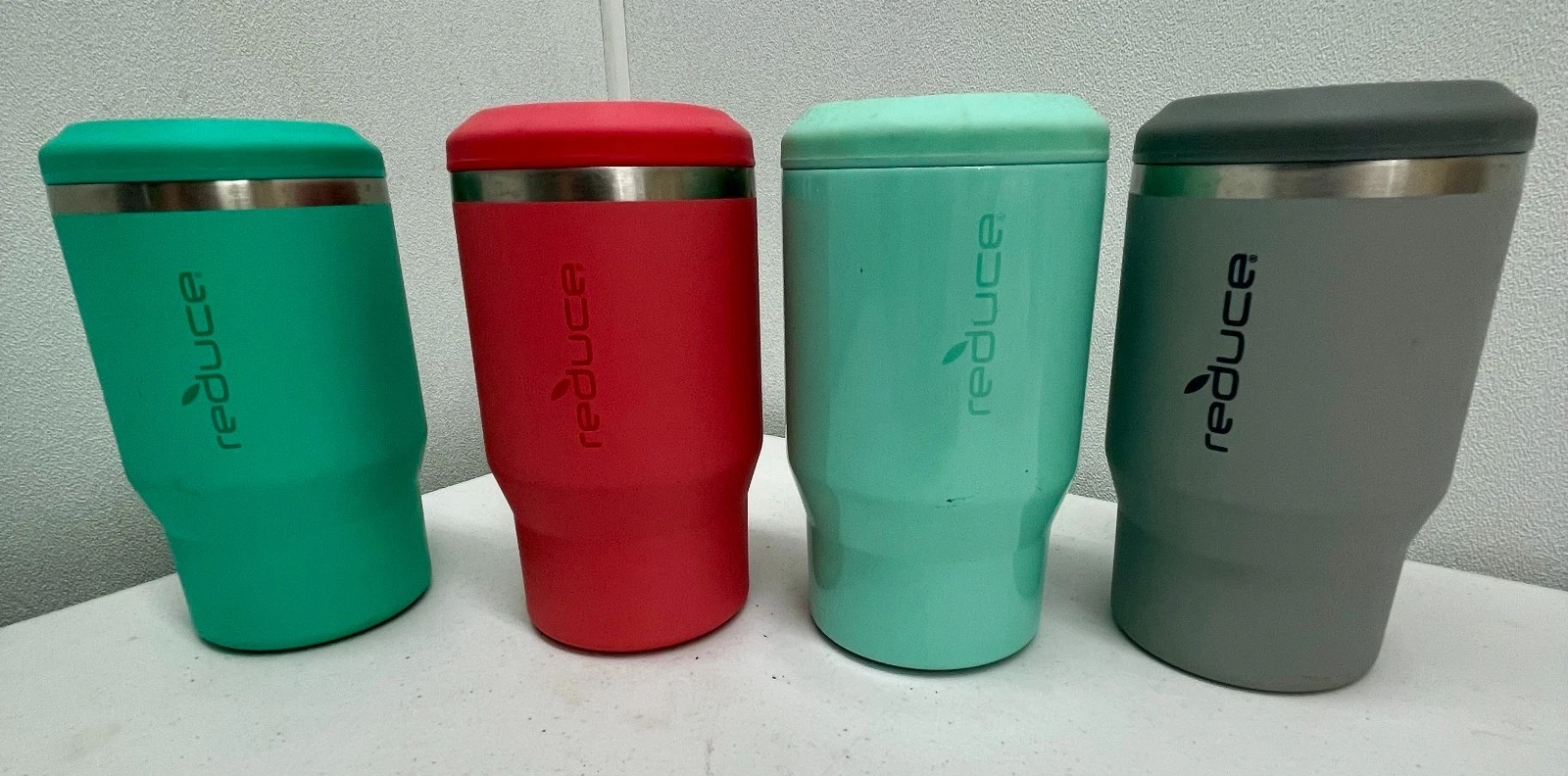 lot of four reduce drink can coolers 14oz pre owned