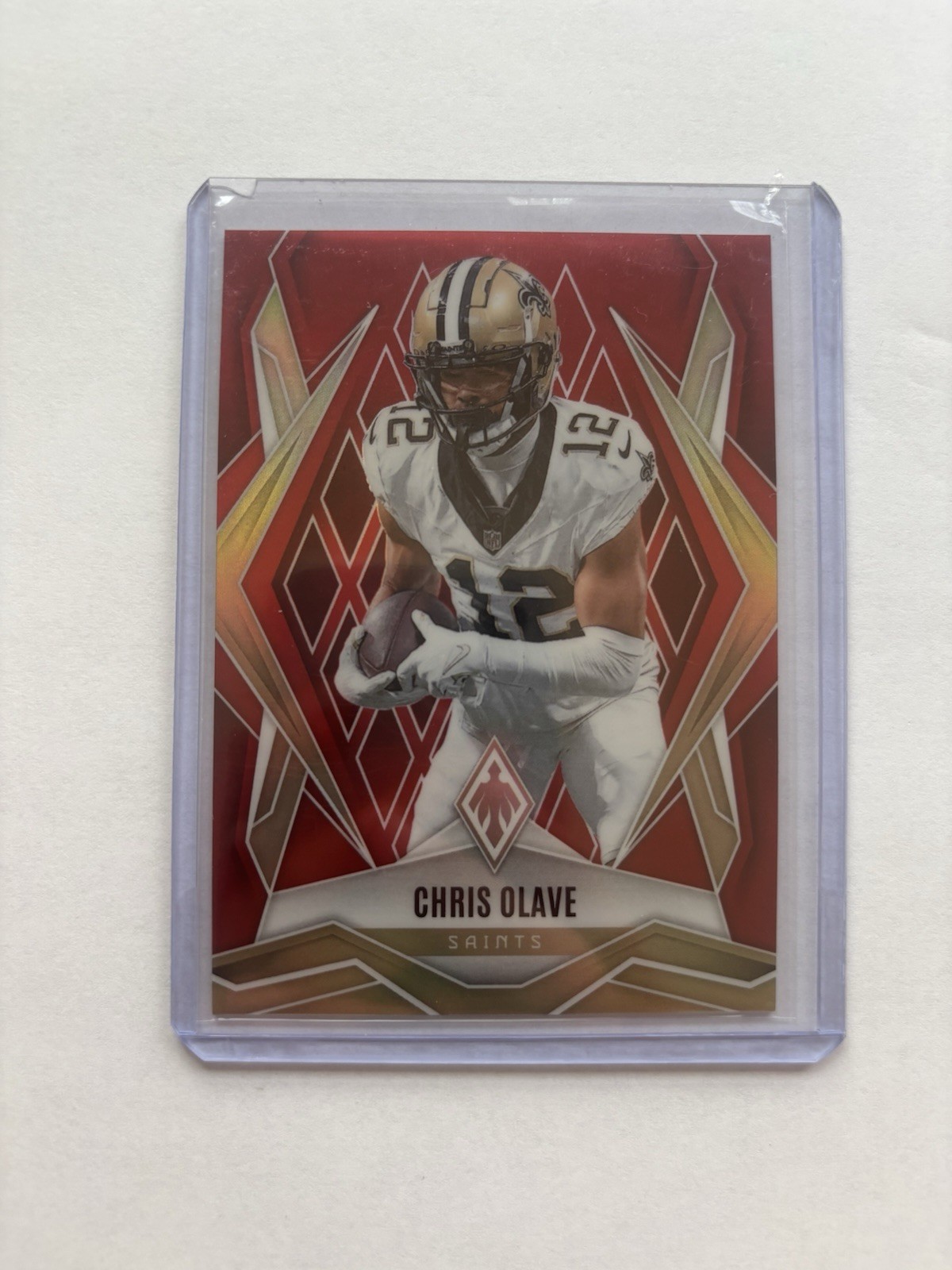 2025 Panini Phoenix - Chris Olave #87 Red Seismic /99