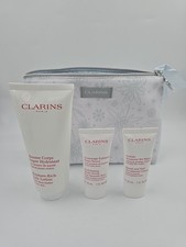 Image of CLARINS Gift Set - BODY LOTION, BODY SCRUB, HAND CREAM, WASH BAG. 