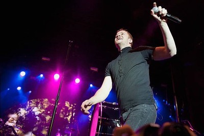 Dan Reynolds of Imagine Dragons performs at the 2014 Allstate Fan - Old Photo 9