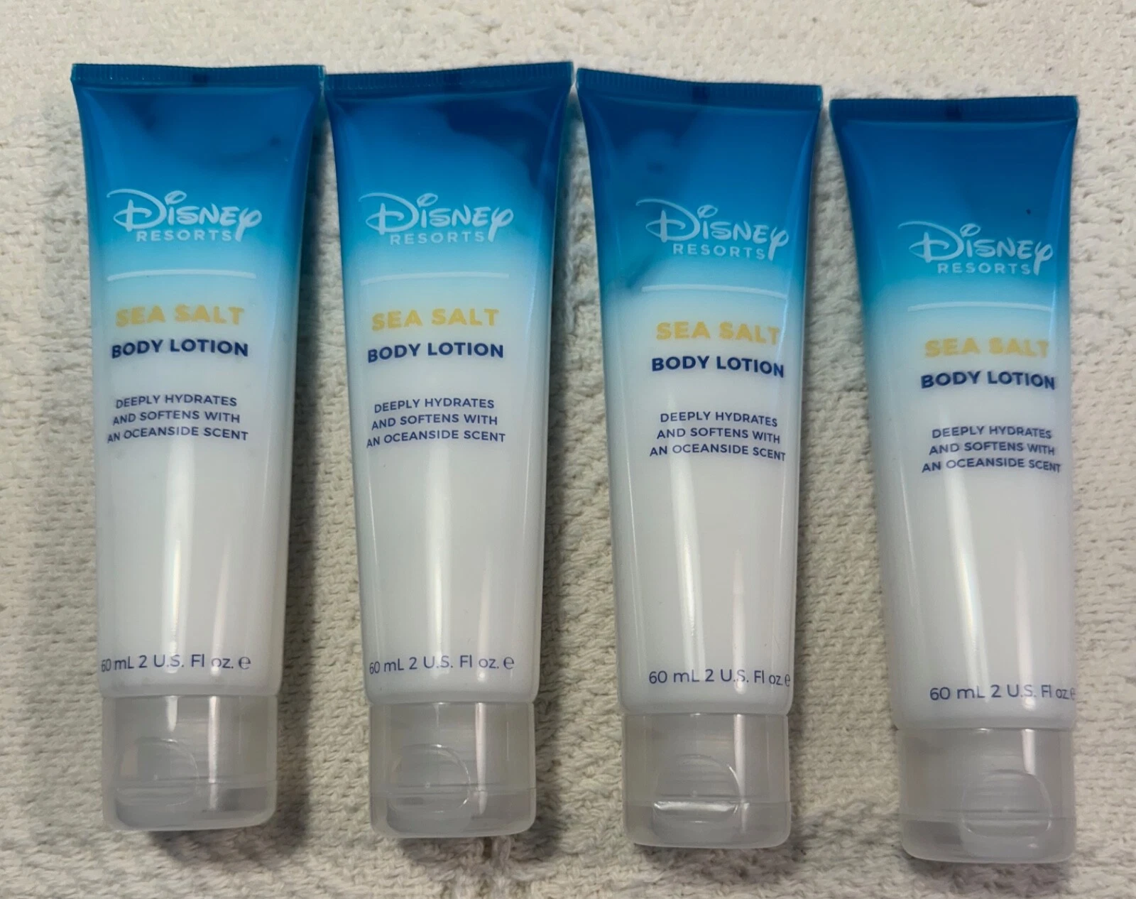 4 New Disney Resorts Sea Salt Body Lotion 2oz. Authentic USA.