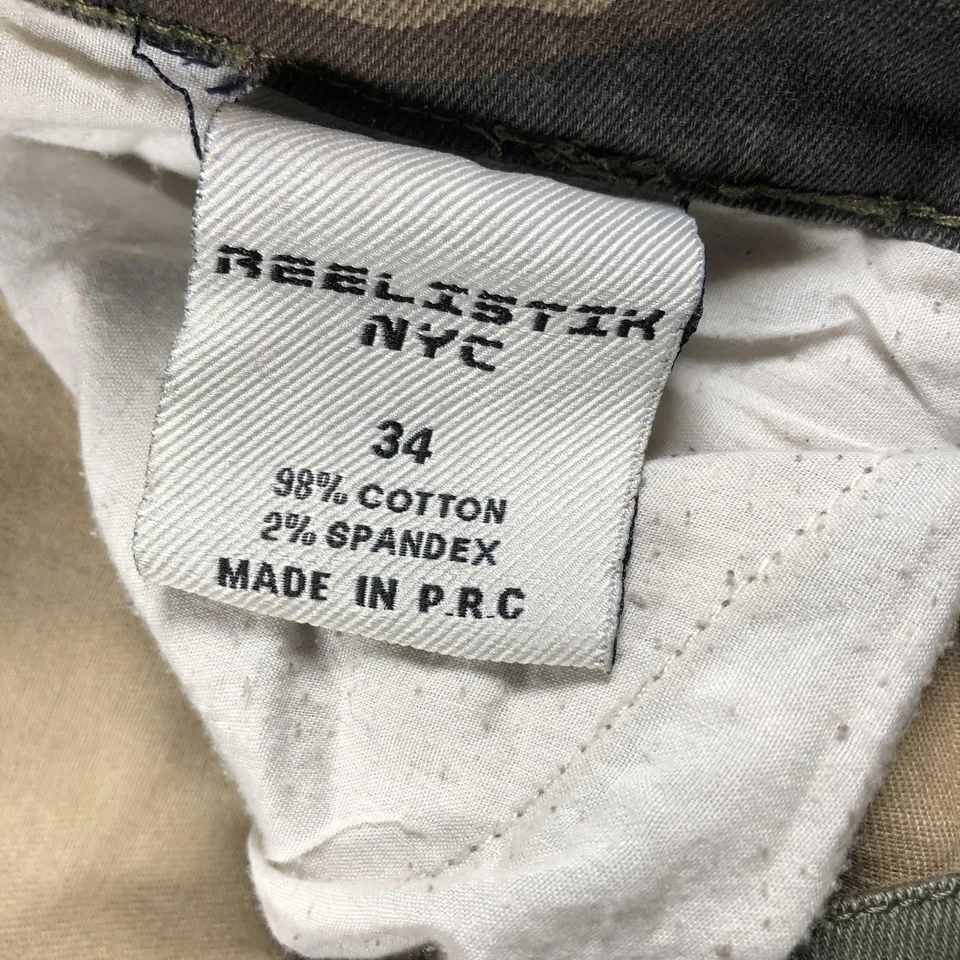 Pantalones de mezclilla Reelistik NYC para hombre 34 correas de retazos de camuflaje cremallera ropa de calle ajustados Foto 3 de 4