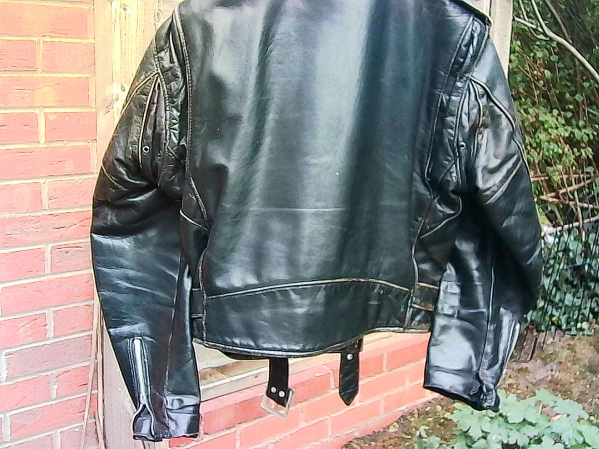 CHAQUETA DE CUERO SCHOTT PERFECTO 118 TALLA 40, DAÑOS BIEN DESGASTADOS, PUÑOS DIVIDIDOS.