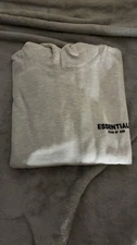Essentials Light Oat Hoddie Size Medium